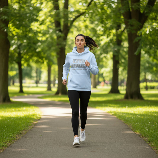 create an image of a woman jogging through the park wearing this hoodie